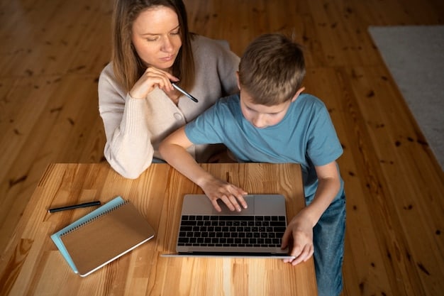 A parent and child sitting together, looking at a computer screen. The child is pointing at something on the screen while the parent is listening attentively, suggesting a discussion about online content and safety.
