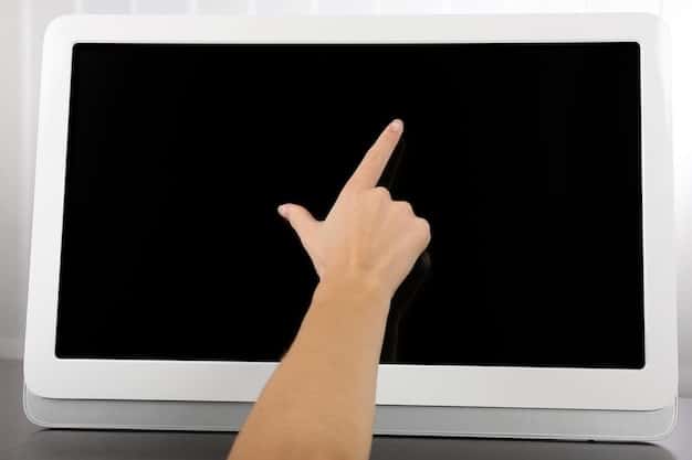 A hand pointing at a smart TV settings menu, specifically the 